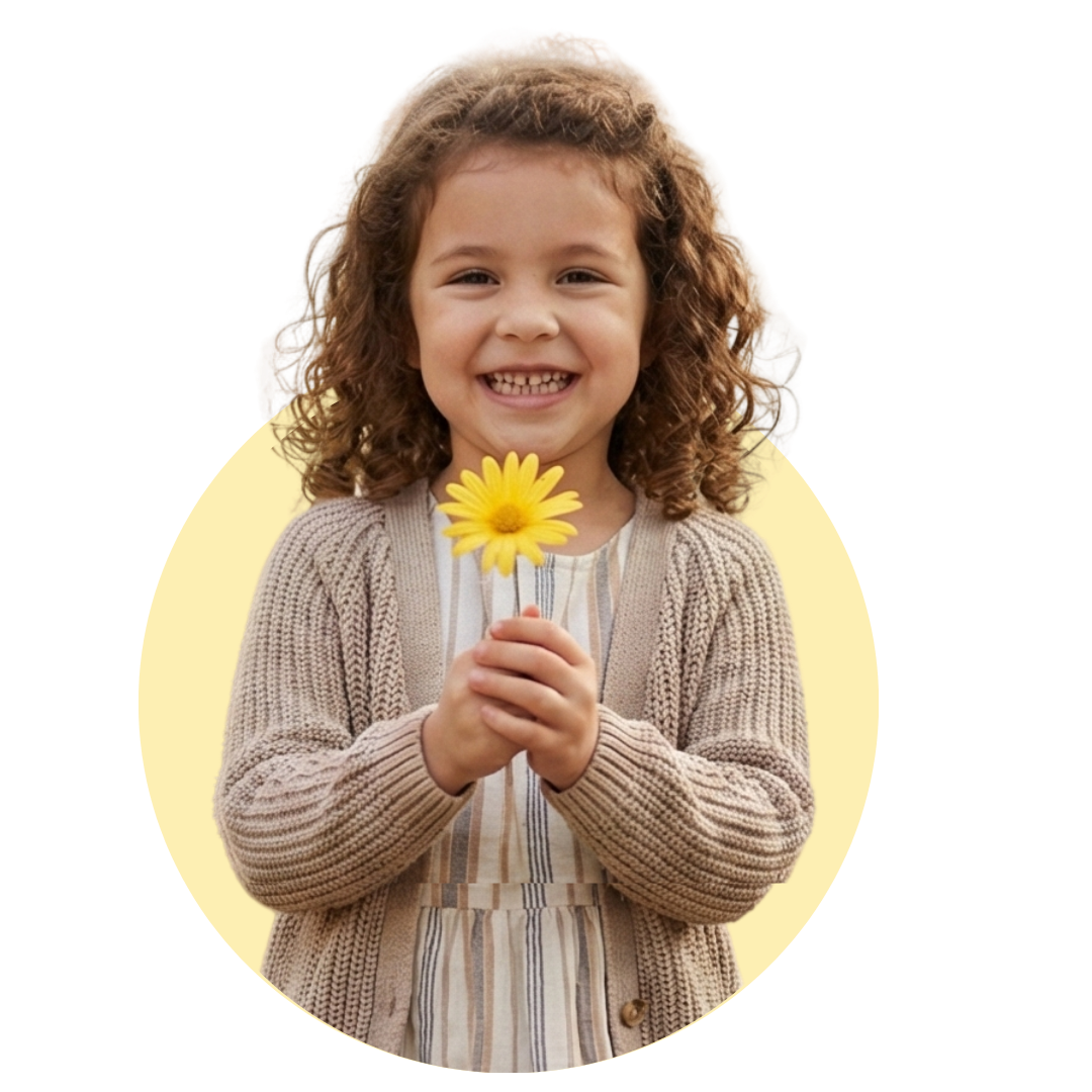 Criança feliz com flor